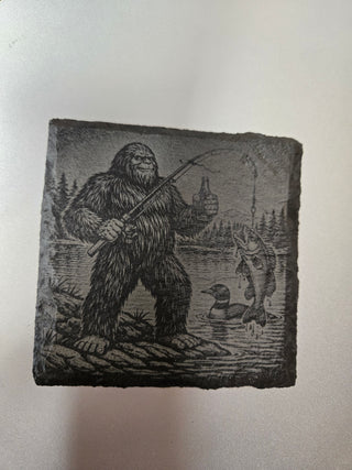 Bigfoot fishing with loon slate coaster