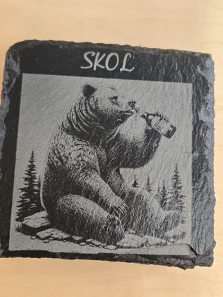 Skol bear drinking a beer slate coaster