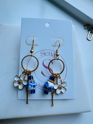 Chinese bead with gold and white flower earrings