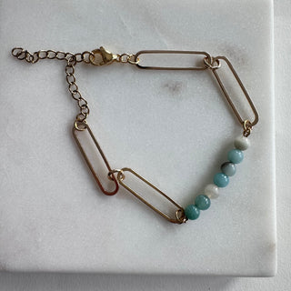 Adjustable Gold bracelet and Light Blue  Stones