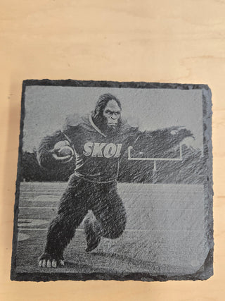 Skol bear playing football slate coaster